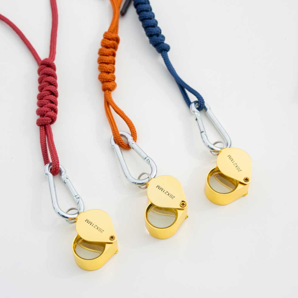 LUPA 20X + CORREA REGULABLE